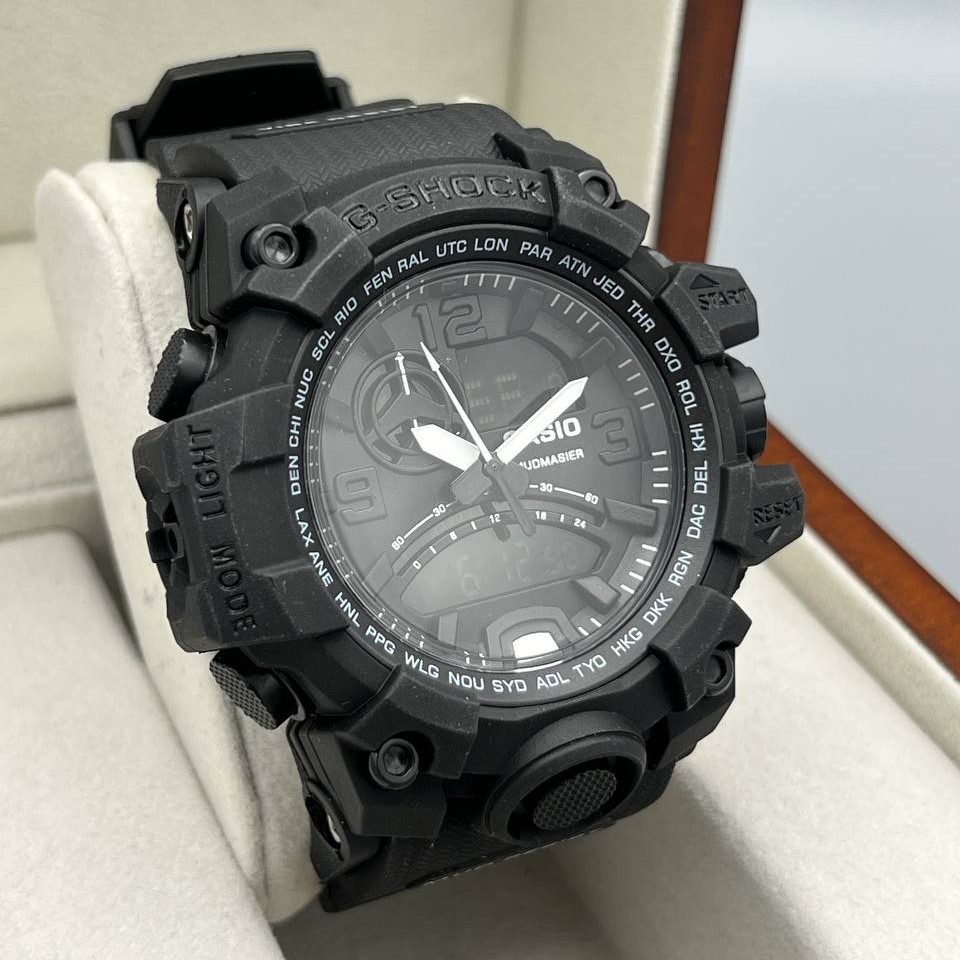ساعت مچی مردانه دو زمانه کاسیو جی شاک دارای رنگبندی Casio