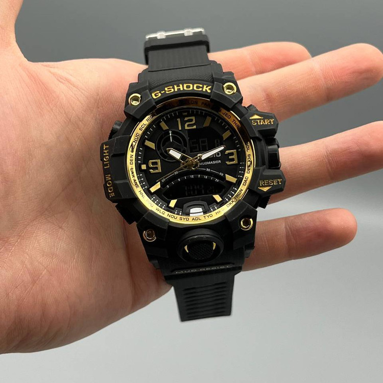 ساعت مچی مردانه دو زمانه کاسیو جی شاک دارای رنگبندی Casio