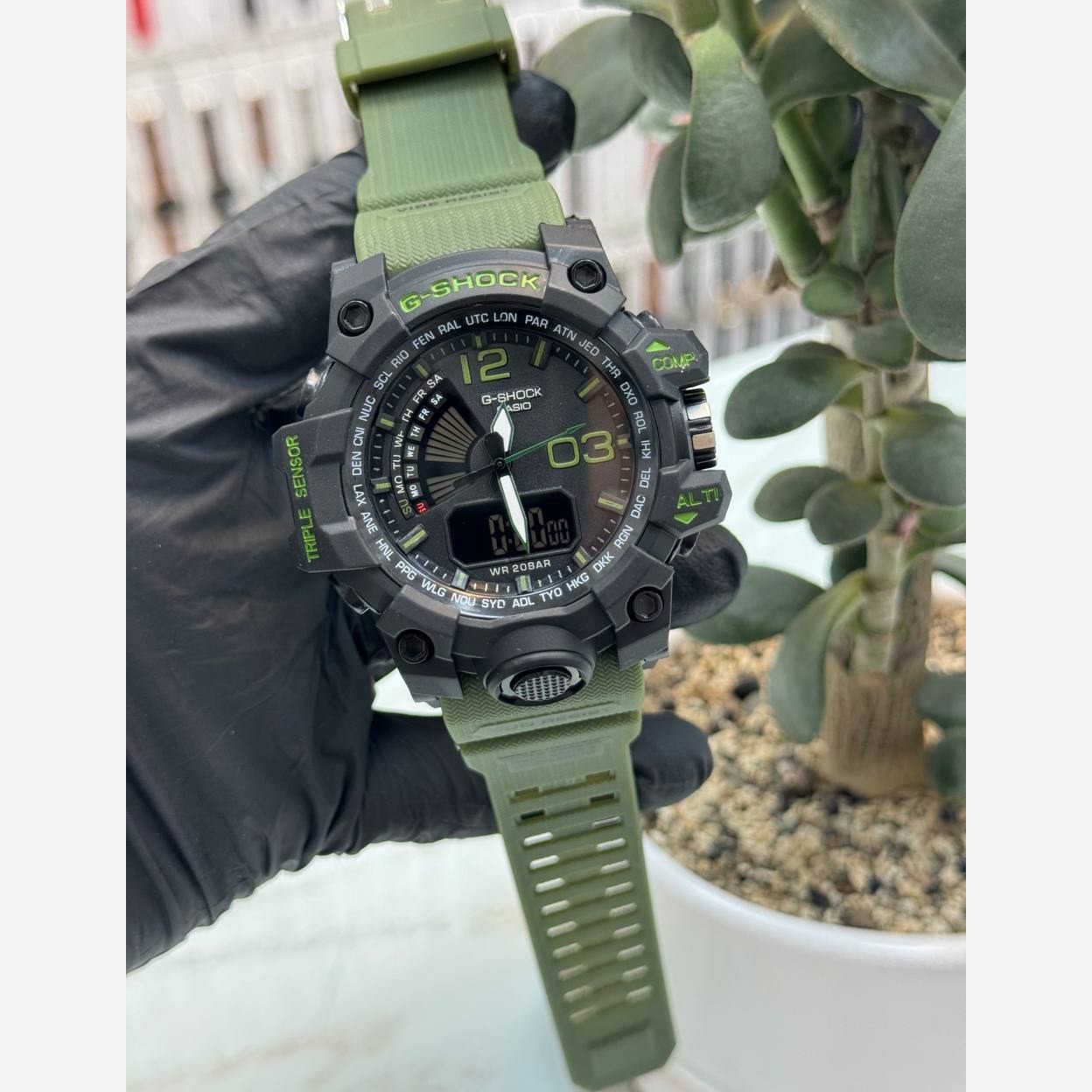 ساعت مچی مردانه دو زمانه کاسیو جی شاک دارای رنگبندی Casio
