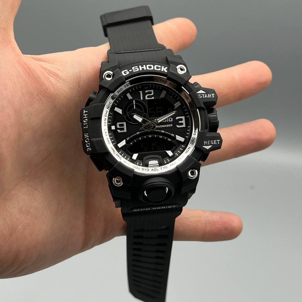 ساعت مچی مردانه دو زمانه کاسیو جی شاک دارای رنگبندی Casio