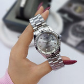 ساعت مچی رولکس قفل اصلی بند استیل توپر قاب یاقوتی Rolex