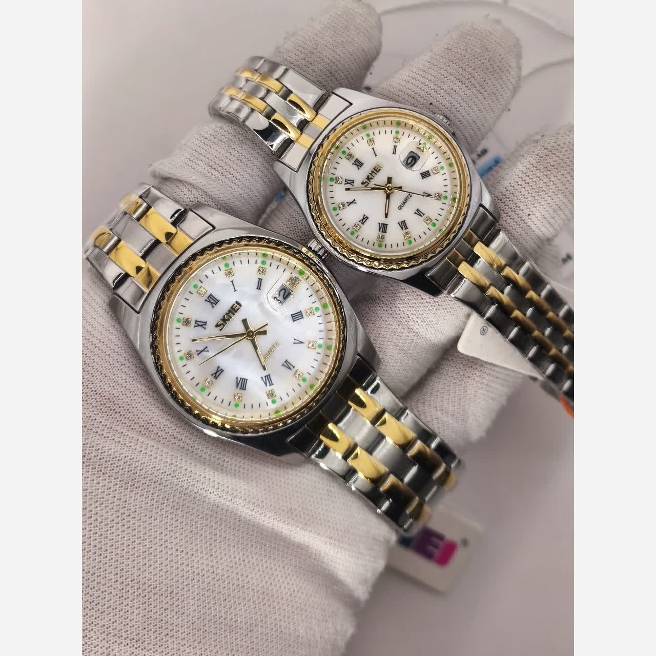 ست ساعت مچی زنانه و مردانه اسکمی SKMEI مدل 9098 اصلی استیل