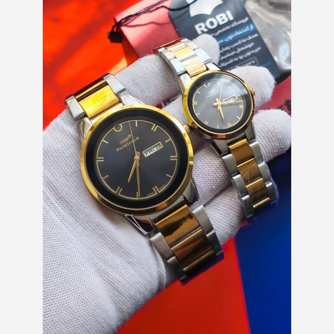 ست ساعت مچی زنانه و مردانه سویس تراک swistrack اصلی با جعبه موتور ژاپن - رگه طلایی