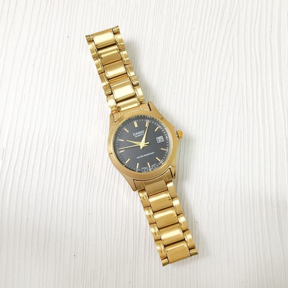 ساعت مچی زنانه کاسیو CASIO موتور ژاپنی بند طلایی صفحه مشکی + جعبه