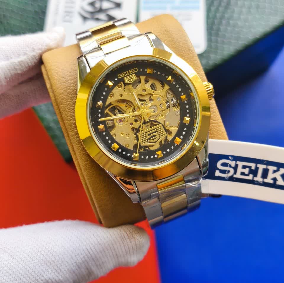 ساعت مچی اتوماتیک مردانه سیکو پنج SEIKO 5 نقره ای طلایی صفحه مشکی